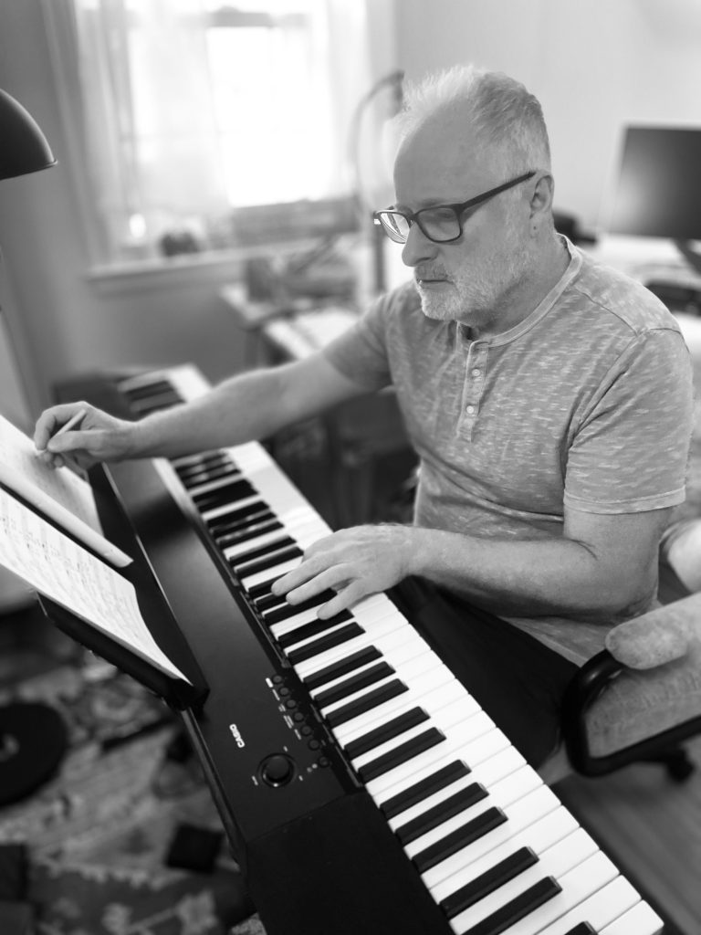 Jack McLaughlin composing at piajno